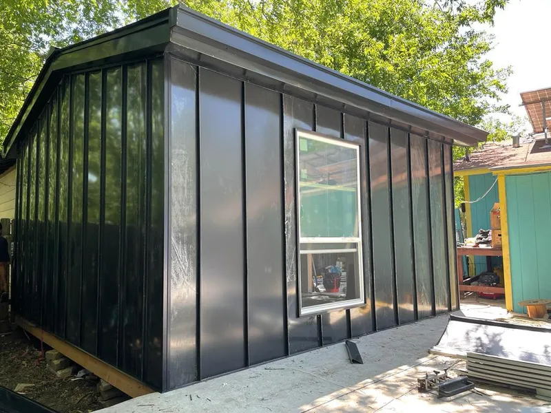 Black standing seam metal wall panels for Metal Roof Installation in Shelton